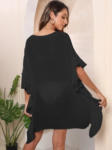 Minimalist black ruffle beach dress cover up in loose fit with textured fabric