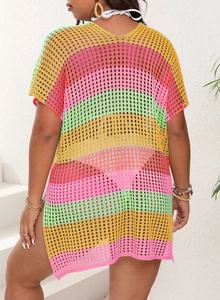 Rear view of rainbow striped crochet beach cover-up with hollow knit and side slits