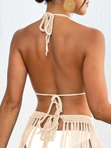 Handmade crochet bikini top with seashell details and back tie-up straps for beachwear
