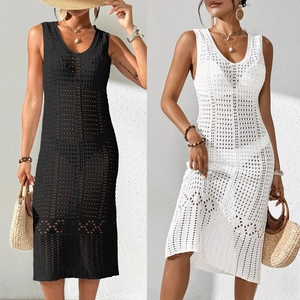 Detail of geometric crochet knit beach cover-up dress in black and white styles