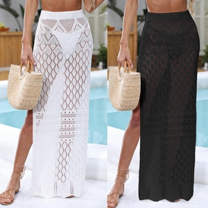 Detail of geometric crochet knit texture on summer beach split maxi skirt cover-ups