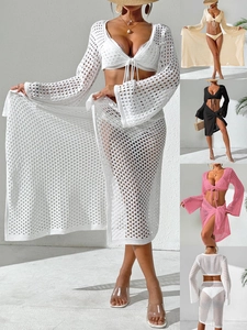 Detail of crochet knit texture on three-piece beach cover-up set with mesh hollow design