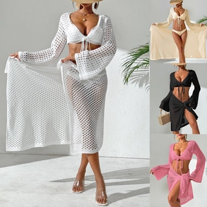 Three-piece crochet beach set featuring wrap skirt and tie-up top in four neutral colors