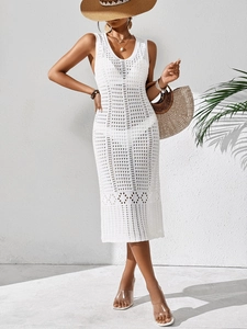 Sleeveless white crochet midi beach dress with hollow knit pattern and v-neckline
