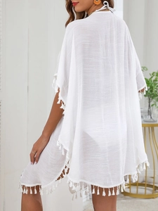 White semi-transparent beach cover-up with fringe tassels and backless tie-up design