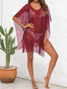 Detailed lace texture and floral patterns on this burgundy V-neck beach cover-up