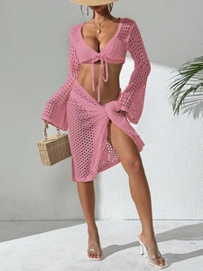 Pink crochet two-piece beach set with long sleeve tie-front top and split maxi skirt