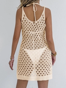 Detail view of beige crochet hollow-out backless halter cover-up dress for beachwear
