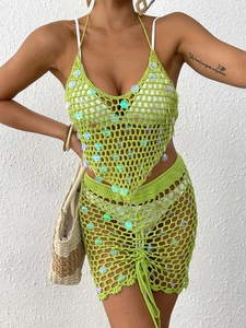 Detail of lime green crochet skirt with iridescent sequins and adjustable drawstrings