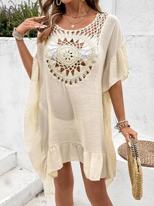 Beige crochet beach cover-up dress with hollow out floral knit and bohemian fringe
