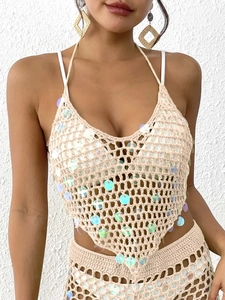 Haut de bikini au crochet beige à paillettes avec col licou pour look de plage bohème