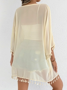 Women's light yellow chiffon beach cover-up with tassel trim details and open front