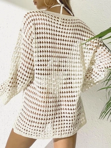 Haut de plage en maille crochetée blanche pour femme avec motifs ajourés et manches longues