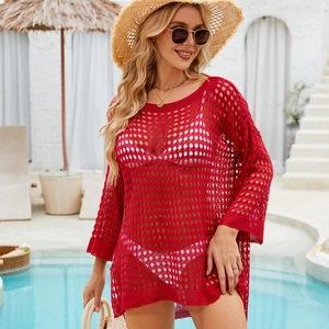 Close-up of red crochet waffle knit beach cover-up showing hollow-out mesh texture