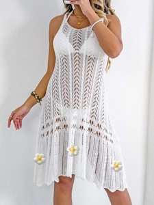 Elegant white crochet beach cover-up dress with hollow knit patterns and thin straps