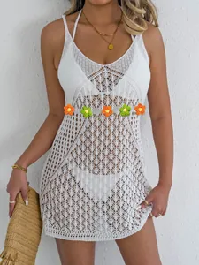 Sleeveless white crochet V-neck beach cover-up dress with geometric knit patterns