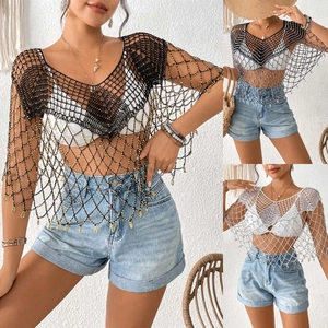 Detailed crochet mesh pattern with gold beads on bohemian beach bikini cover-up shawl