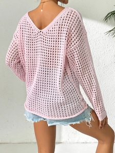 Detail view of pink hollow out V-neck knit sweater with back ribbon tie and lace stitching
