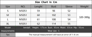 Detailed size chart for women's V-neck sweater with chest and length measurements