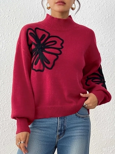 Women's wine red lantern sleeve sweater with black flower embroidery and mock neck design