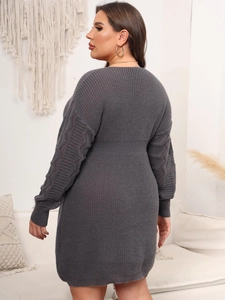 Dark grey V-neck knit dress with long sleeves and elegant diamond cut-out patterns