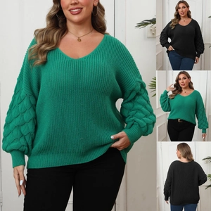 Detail of plus size V-neck sweater showing textured lantern sleeves and knit fabric
