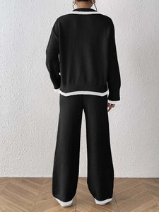 Ensemble en tricot noir pour femme avec liserés blancs sur le pull et le pantalon large