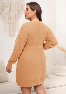 Detailed back view of a thick amber knit plus size dress with hollow lace sleeves