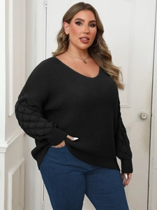 Plus size black V-neck knit sweater with textured bubble sleeves and elegant fit