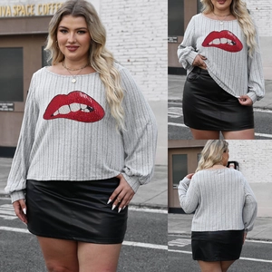 Three-way view of women's plus size grey striped sequin lip top and black leather skirt