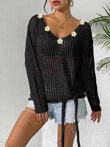 Women black V-neck hollow knit cover-up with white daisy appliqués and waist ties