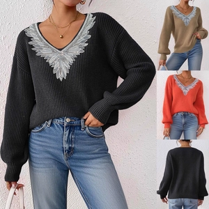 Detailed V-neck rib-knit sweater featuring elegant lace feather appliques on neckline