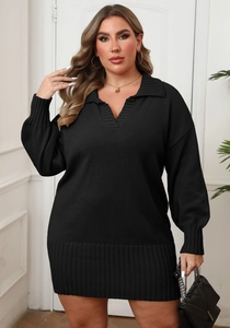 Detail of black knit sweater dress featuring oversized lantern sleeves and a polo neck design