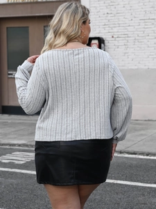 Grey rib-knit long sleeve t-shirt and black leather mini skirt outfit for women