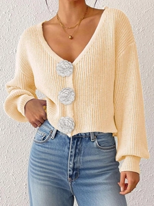 Cream knit cardigan for women with large 3D white flower buttons and V-neckline