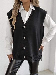 Gilet en maille noir à col en V avec boutons en perles et design sans manches ample