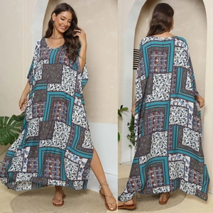 Dual view of bohemian kaftan maxi dress with ethnic floral print and side slits