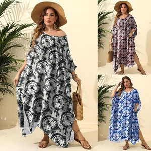 Bohemian plus size kaftan dress with vortex print and side slits for beach vacation