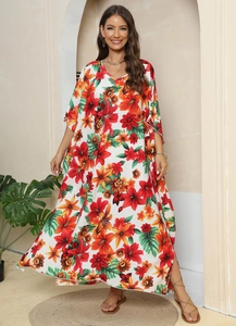 Detail of V-neck tropical floral maxi dress with wide sleeves and bohemian print