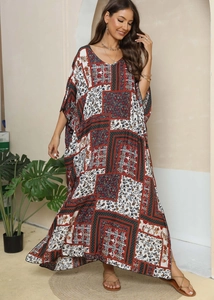 Detailed pattern of Bohemian floral print long kaftan dress with V-neckline and batwing sleeves