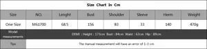 Detailed size guide table with measurements for oversized knit sweater model M61700