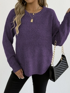 Close-up of a purple crewneck knit sweater with thick texture and long sleeves for women