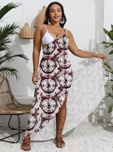 Detail of plus size beach cover-up skirt with brown tie-dye pattern and side slit