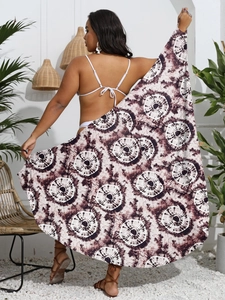 Detail of bohemian tie-dye beach wrap showing sheer fabric texture and circular pattern