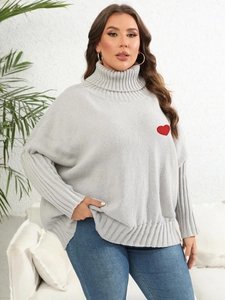 Grey oversized turtleneck knit sweater featuring a prominent red heart patch for women