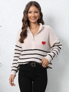 Women's beige half-zip knit sweater with black stripes and red heart embroidery