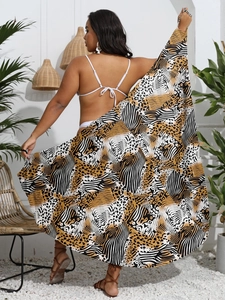 Detail of bohemian leopard and zebra print beach sarong wrap with a flowy draped design