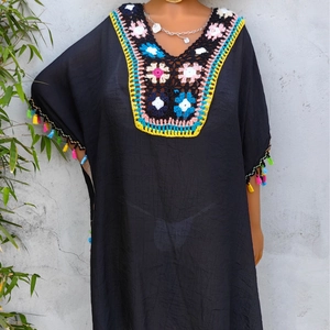 Bohemian black cover-up dress with colorful crochet neckline and vibrant fringe sleeves