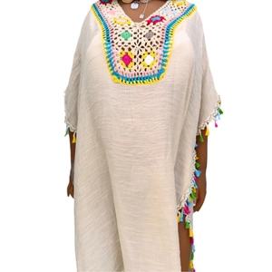 Bohemian beige crochet patchwork kaftan dress with colorful fringes and V-neckline
