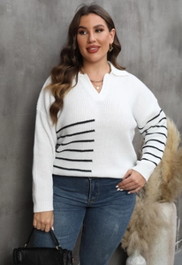 Detail of the oversized striped knit sweater featuring a white V-neck and polo collar design